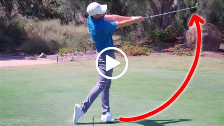 Should weight be on balls of feet in golf swing?